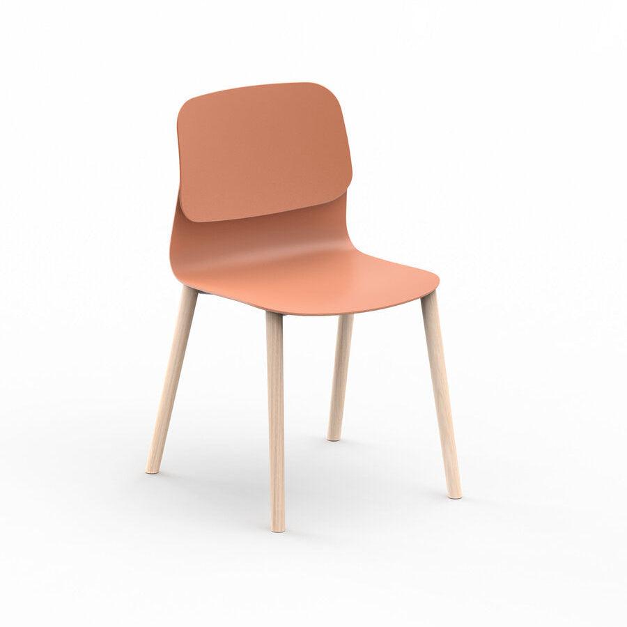 Chair with a peach-colored seat and backrest on a white background